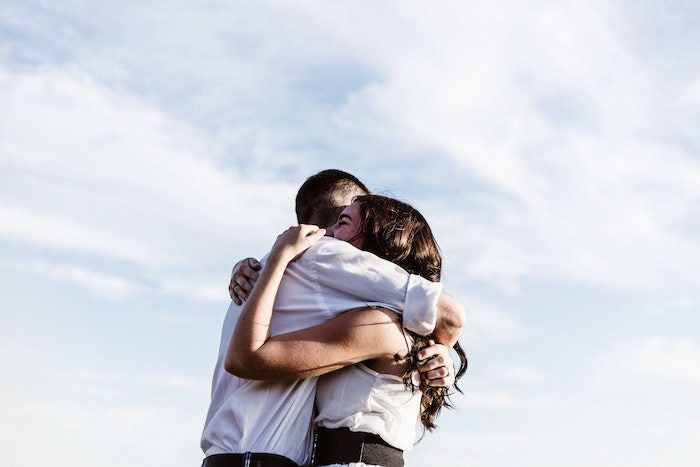 A couple reconnecting after working through crisis together